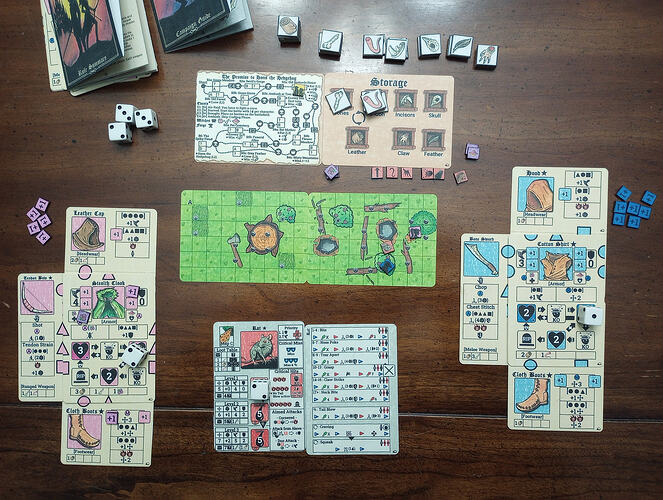 Character 'boards' on the left and right. In the middle, top to bottom: campaign map and inventory, combat encounter map, and cards for the enemy I'm fighting.